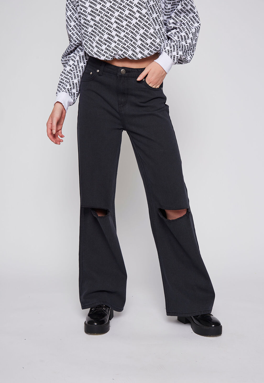 Jeans negro roto sales en la rodilla mujer