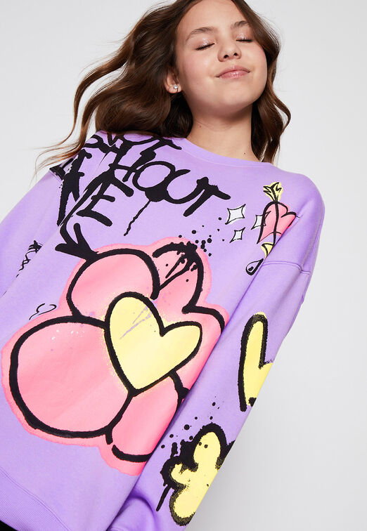 Poleron Sin Manga Oversize Graffiti Morado Family Shop