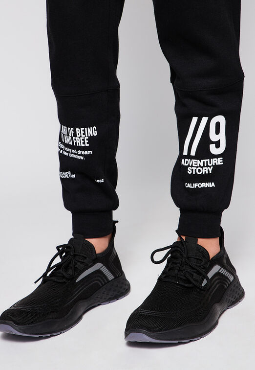Pantalon de Buzo Print Numero Negro Family Shop