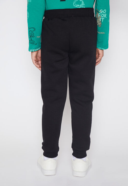 Pantalon De Buzo Nino Negro Dinosaurio Family Shop